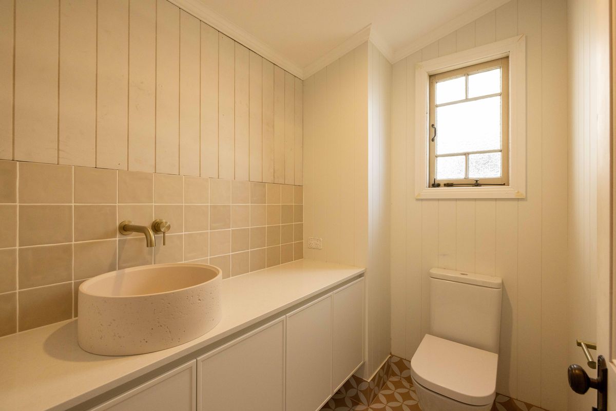 Renovated bathroom with stone basin in a Balmoral Queenslander