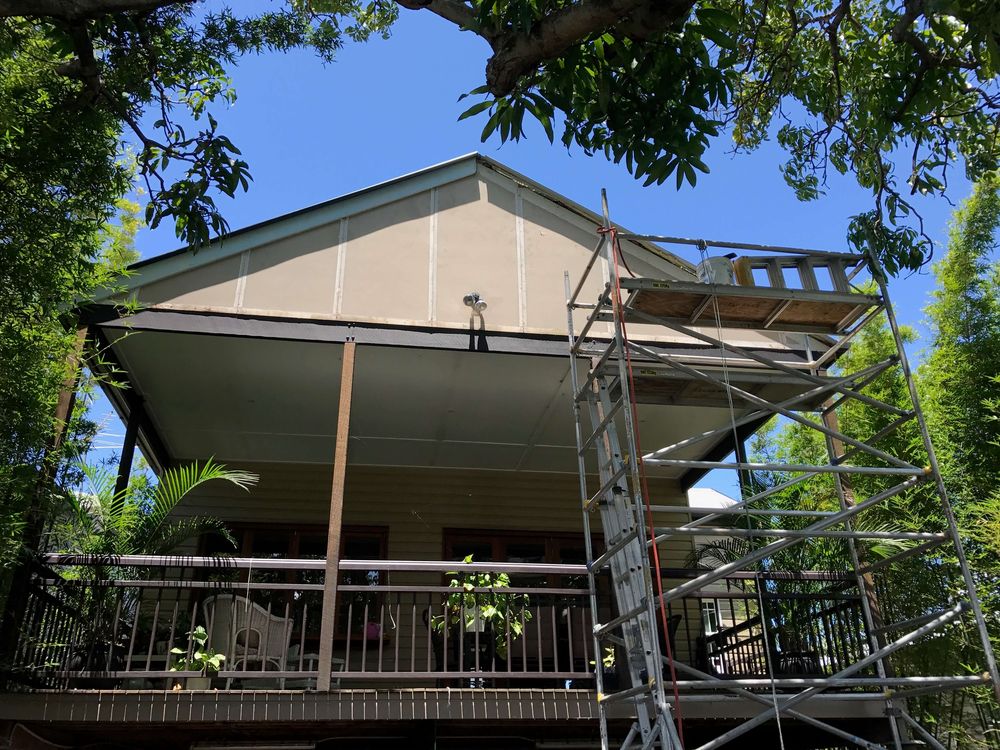 Queenslander gable in Clayfield with a scaffold tower for fascia repairs